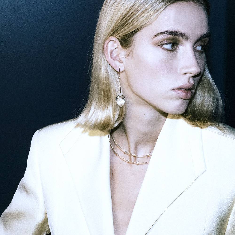 Paola Grande Gioielli AMI Amo in oro rosa e cristalli Acquista Ora