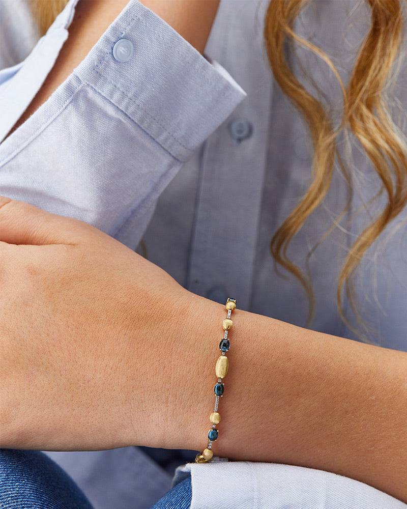 Nanis Bracciale tennis "DANCING AZURE" in oro, diamanti e topazio London blu – Nanis Italian Jewels Online Outlet